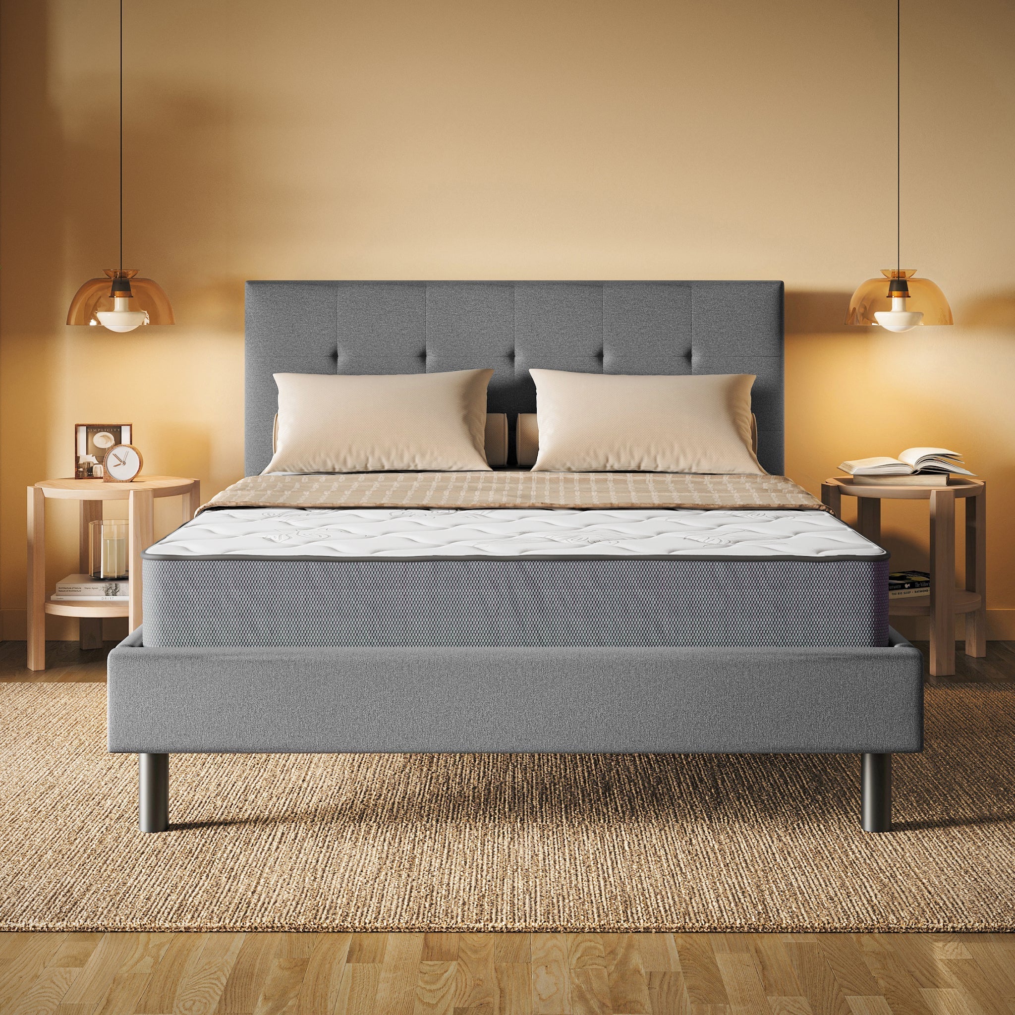 Gray upholstered bed with a mattress in a bedroom setting.