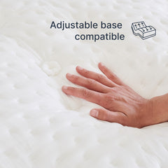Hand on a mattress with text 'Adjustable base compatible' and an icon above.
