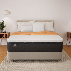 Bed with OrthoAvant mattress in a room setting