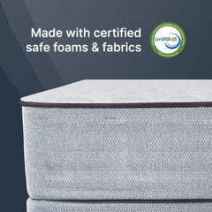 Mattress with CertiPUR-US certification logo on a dark blue background