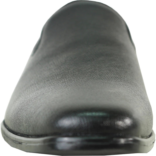 Black leather slip-on shoe on a white background