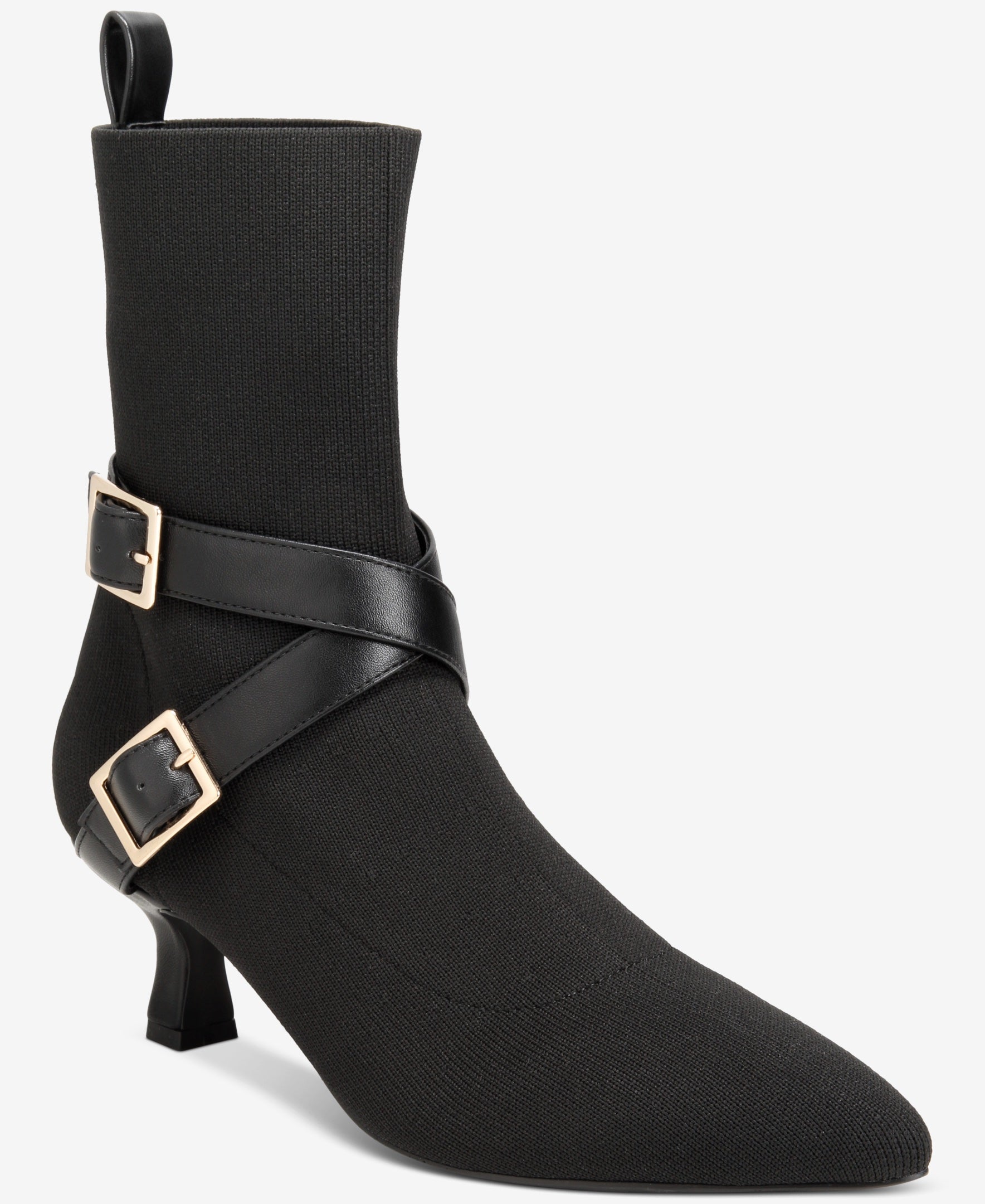 Black ankle boot with gold buckles on a white background