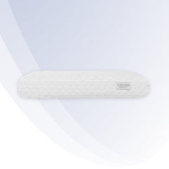 White bath mat with a brand label on a white background