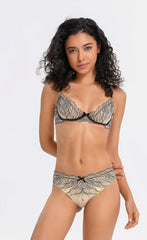 Woman wearing a patterned bikini set on a white background