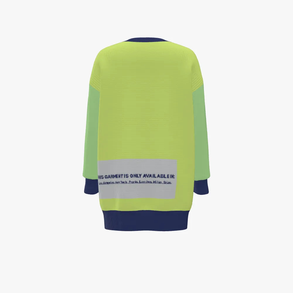 Green and blue sweater with a visible brand label on a white background