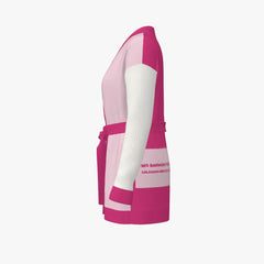 Pink and white long-sleeve garment on a light gray background
