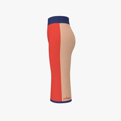 Color-blocked knee support with red, beige, and blue sections on a white background