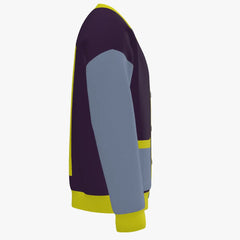 Color-blocked sweater with purple, gray, and yellow sections on a white background