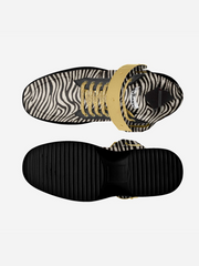 Zebra print sneaker with gold laces on a white background