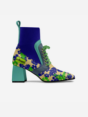 Colorful ankle boot with floral pattern on a white background