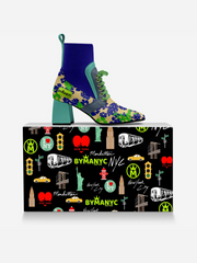 Colorful shoe with floral pattern on a BYMANYC branded box