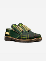 Green plaid shoes with brown accents on a white background