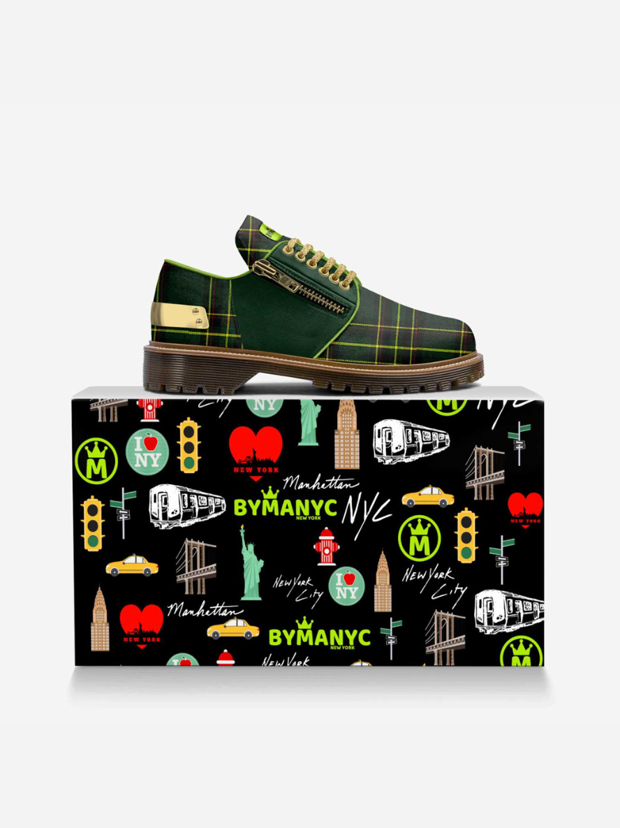 Shoe with colorful design and matching box featuring New York City icons on a white background
