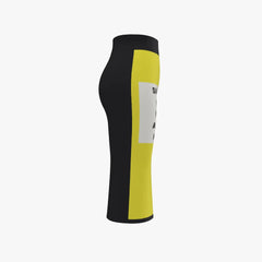 Black and yellow knee brace on a white background