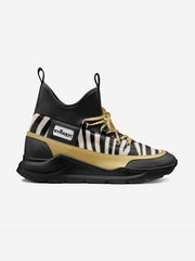 Black and beige sneaker with zebra pattern sole on a white background