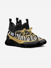 Black and gold sneaker with zebra pattern on a light gray background
