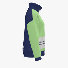 Side view of a navy and green pullover with text on a white background