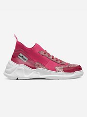 Pink and white sneaker with glittery accents on a light gray background