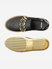 Black loafers with gold chain detail on a white background