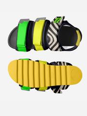 Colorful slide sandals with zebra pattern and yellow sole on a white background