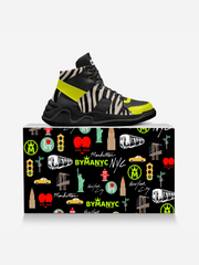 Black and yellow sneaker on a box with New York-themed design