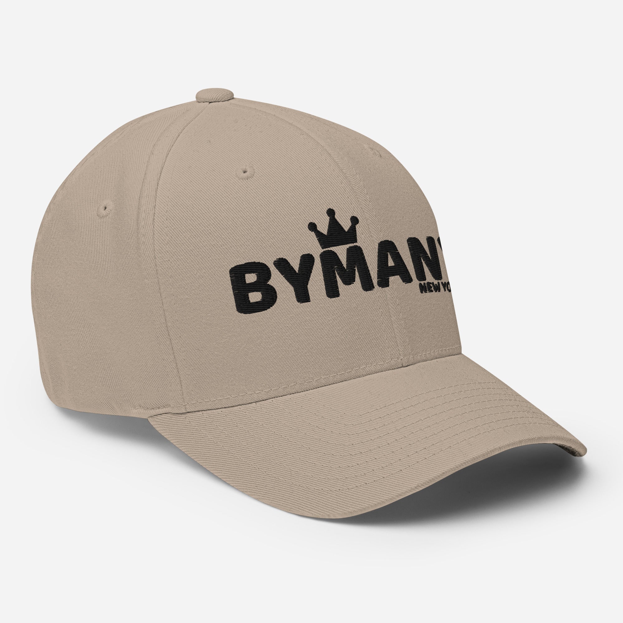Beige cap with 'BYMANN' logo on a light gray background