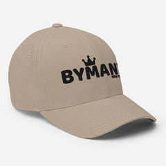 Beige cap with 'BYMANN' logo on a light gray background