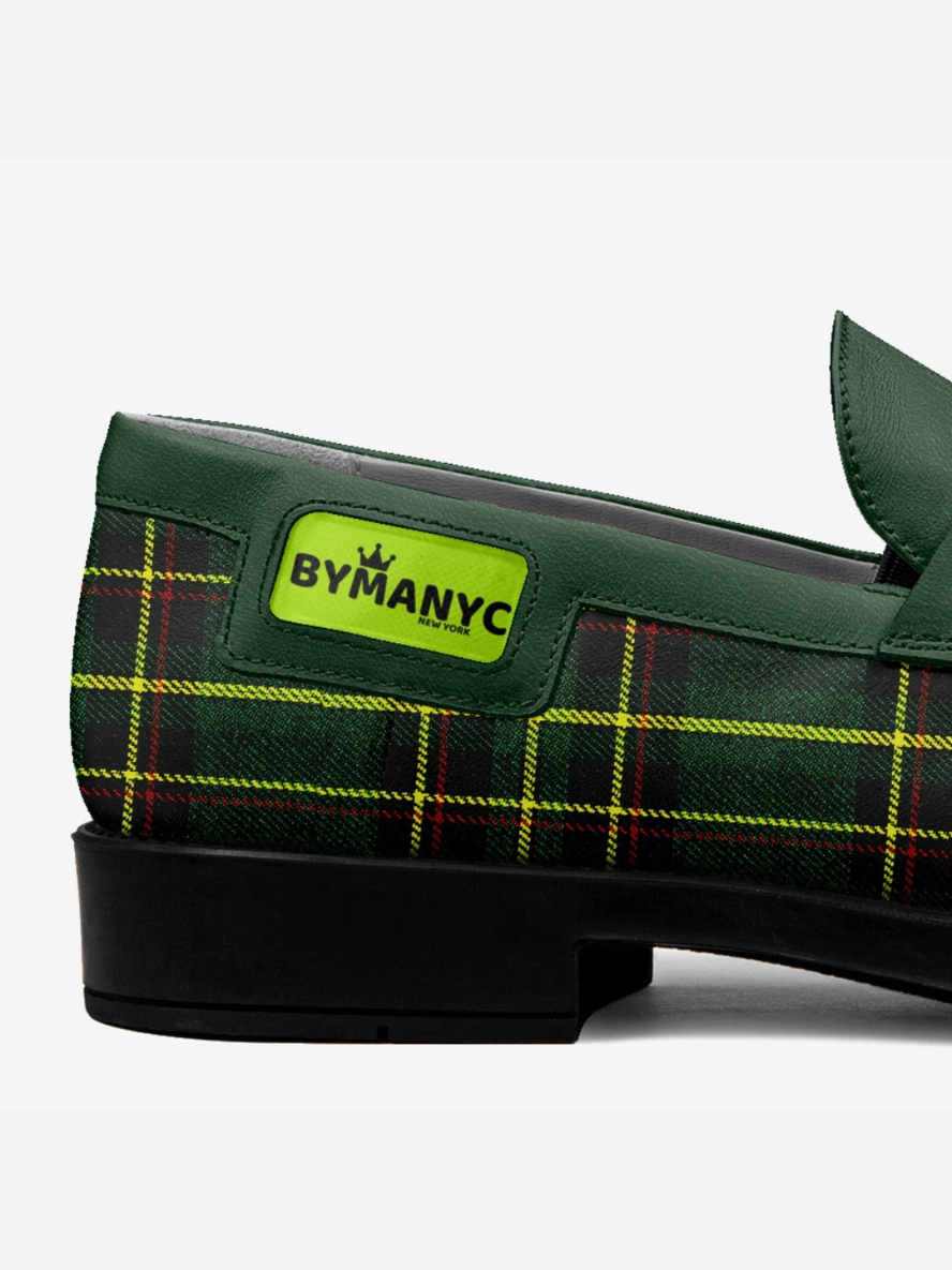 Green shoe with plaid pattern and ByManyc label on a white background