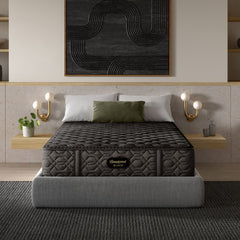 Gray mattress on a bed in a modern bedroom with decorative elements.