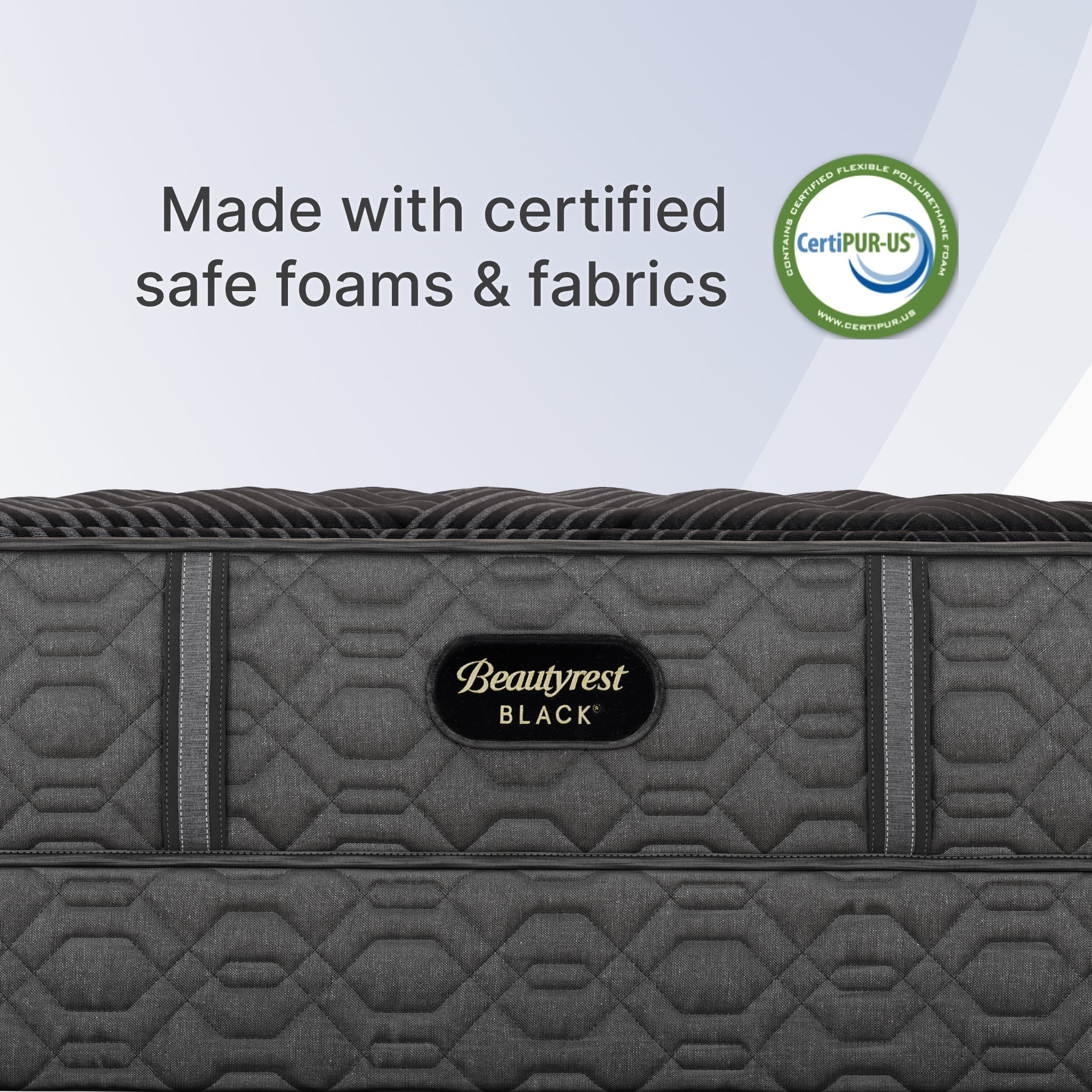 Gray Beautyrest Black mattress with CertiPUR-US logo on a light gray background