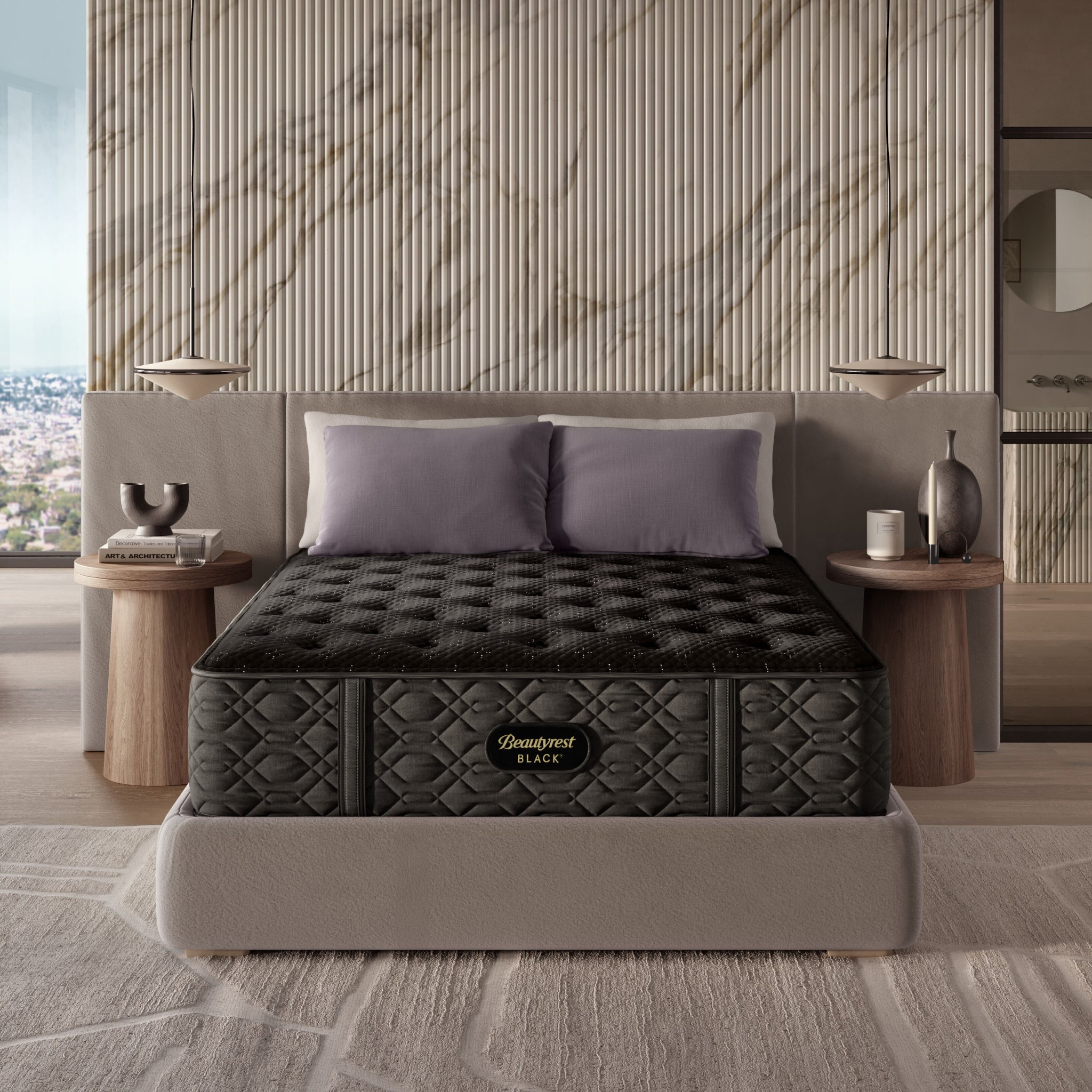 Black mattress on a bed in a modern bedroom with marble wall.