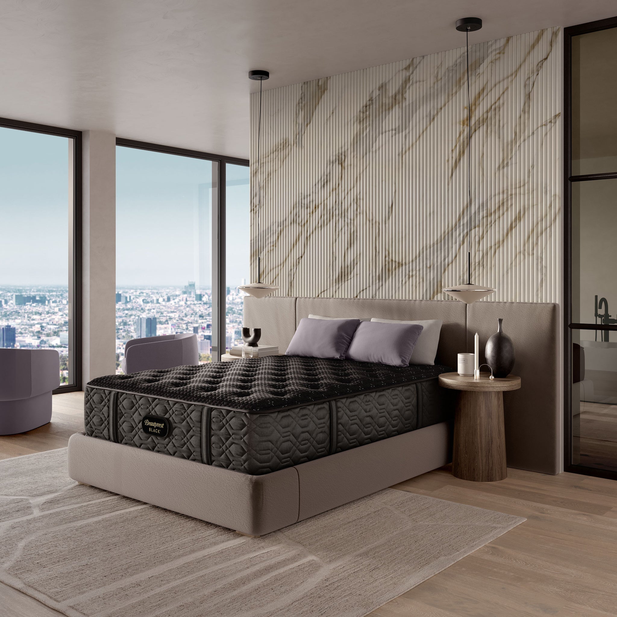 Bedroom with a large bed and marble wall