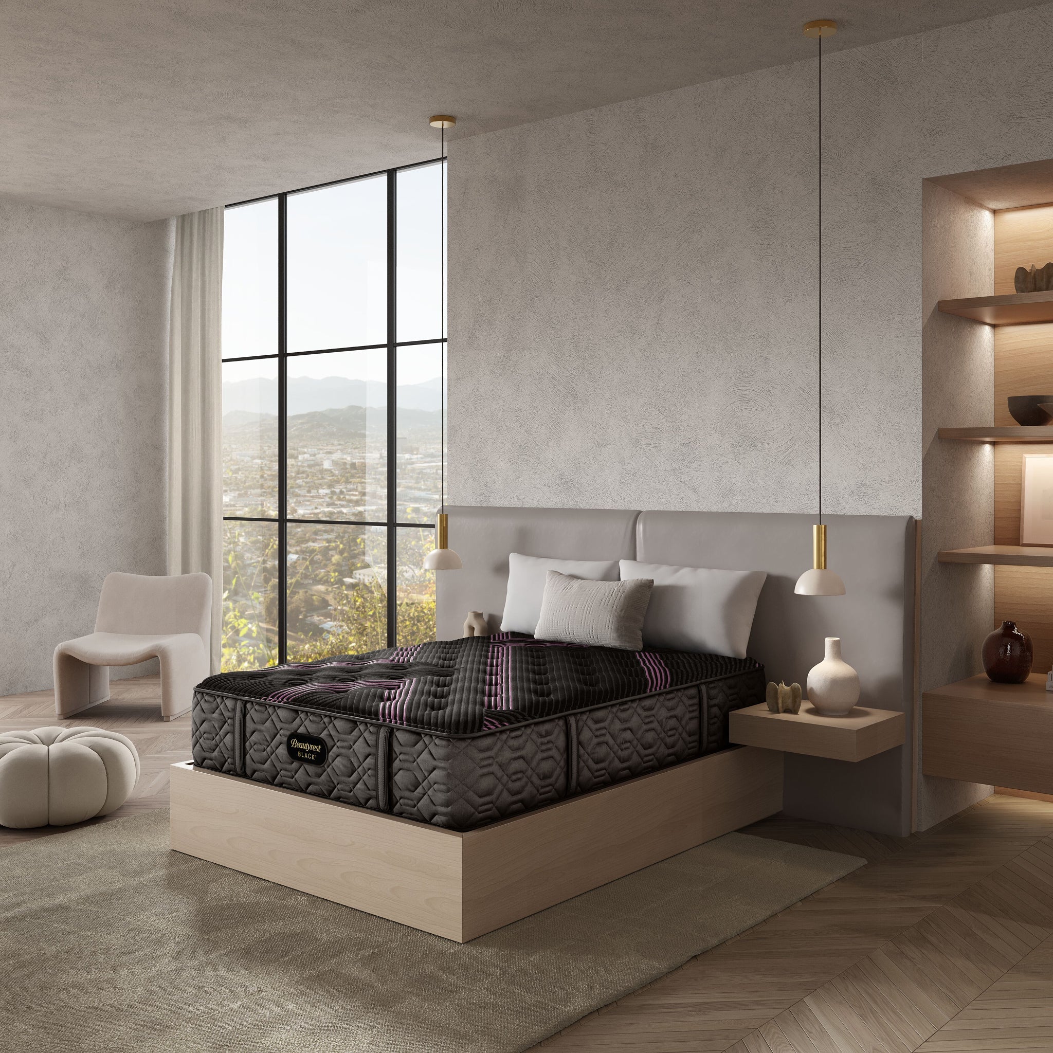 Modern bedroom with a mattress on a bed frame, large window, and decorative elements.