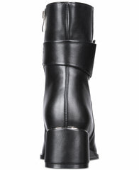 Black leather boot with a platform sole on a white background
