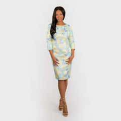 Woman wearing a floral dress on a white background