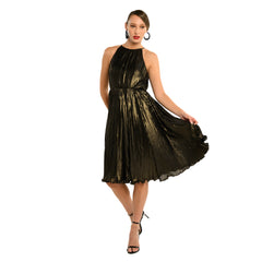 Woman wearing a black and gold dress on a white background