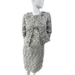 Mannequin wearing a black and white patterned outfit on a white background
