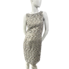 Mannequin wearing a sleeveless, textured dress on a white background