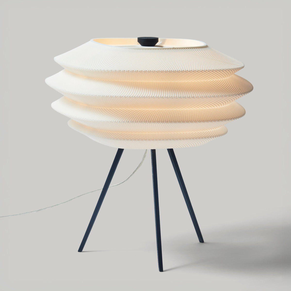 Modern table lamp with a unique design on a gray background