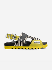 Zebra-patterned sandal with yellow sole on a white background