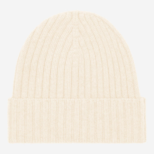 Beige knit beanie on a light gray background