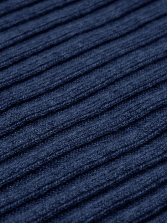 Close-up of blue textured fabric with horizontal lines
