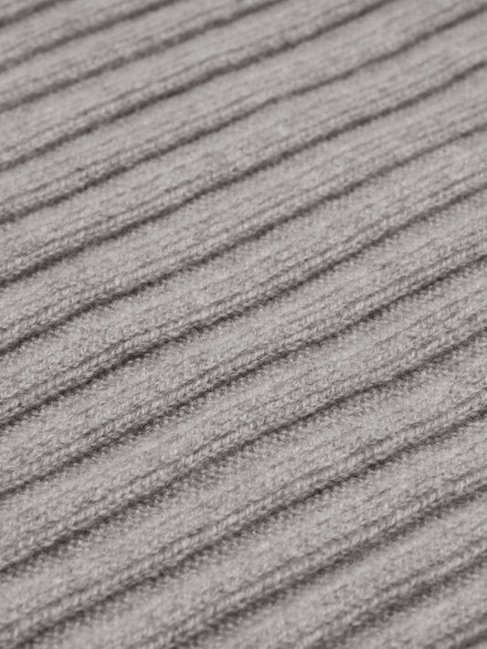 Close-up of gray textured fabric with horizontal lines