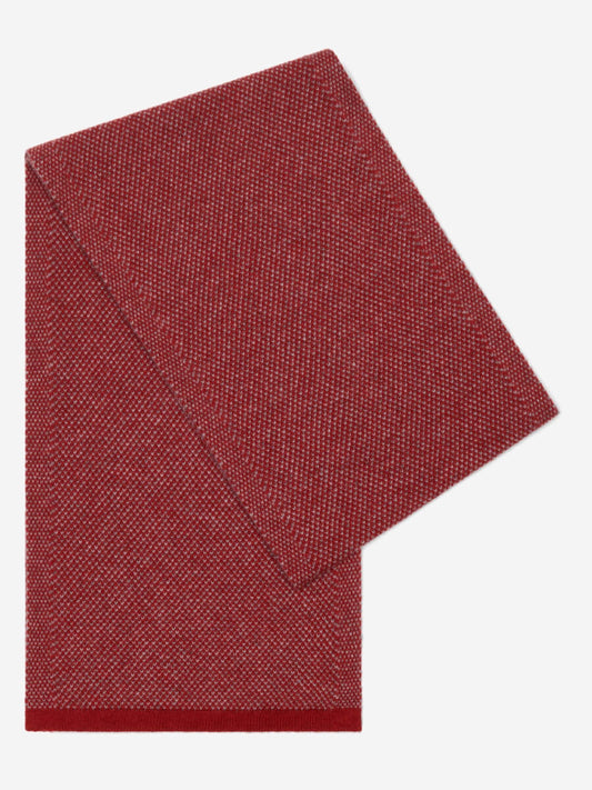 Red woven placemat on a white background