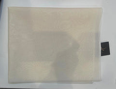 Beige fabric with a tag on a white background