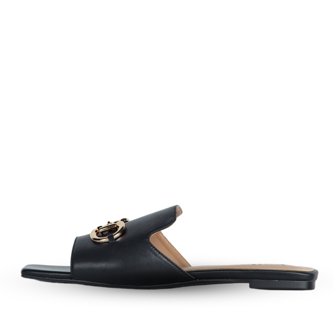 Black sandal with a gold chain detail on a white background