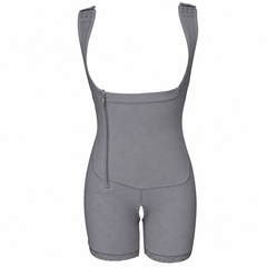 A gray compression shapewear bodysuit with shoulder straps, a front zipper, and fitted shorts, shown against a plain white background.