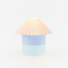 Lamp with a beige shade and light blue base on a white background