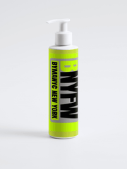 Bottle with pump dispenser on a white background