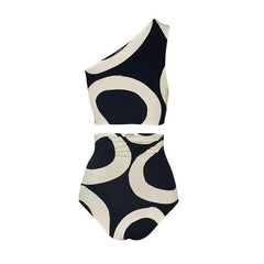 Black and white swimsuit with geometric pattern on a white background
